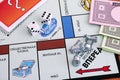 Monopoly Board Game. Three tokens on field Start of gameboard wi Royalty Free Stock Photo