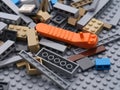 A pile of Lego pieces with a brick separator in it.