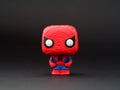 A Spider-Man Funko POP Mini Vinyl Figure on a black background