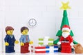 Tambov, Russian Federation - November 4, 2020 Lego businessperson minifigures having a Christmas party in their office.