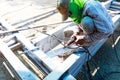 Tame welder. the welder welds iron. Royalty Free Stock Photo