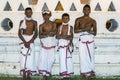 Tamerine Players wait for the start of the Esala Perahera in Kandy, Sri Lanka.