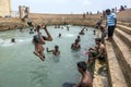 Tamil bathers enjoy a swin in Keerimalai Sacred Bath in the northern Sri Lankan region of Jaffna.