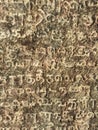 Tamil letters engraved in a temple in tamil Nadu India. The temple name is rock cut cave temple.