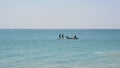 Tamilnadu fishermen getting their wooden boat or catamaran for fishing in Bay of Bengal Royalty Free Stock Photo