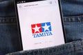 Tamiya website displayed on smartphone hidden in jeans pocket