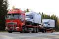 Renault Premium Transports Light Trucks along Road