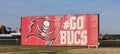 Tampa, Florida February 4 2021: Tampa Bay Buccaneers Go Bucs Billboard near the stadium for the Superbowl LV Royalty Free Stock Photo