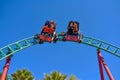 Nice couple taking selfie while spinning vertiginously in Cobra`s Curse rollercoaster at Bush Gardens Tampa Bay