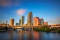 Tampa skyline at sunset with Hillsborough river in the foreground Royalty Free Stock Photo