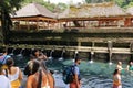 Tampak Siring, Tampaksiring, Bali, Indonesia - January 31 2024: people take a bath in the Tirta Empul temple
