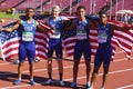 American 4x100 relay team with flags after winning gold on the IAAF World U20 Championship in Tampere,