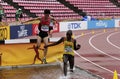 TRUNG CUONG NGUYEN VIETNAM and DENIS CHEROTICH UGANDA running 3000 metres STEEPLECHASE on the IAAF Royalty Free Stock Photo