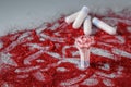 Tampon with red glitters on grey background Royalty Free Stock Photo