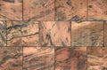 Tan and black marbled stone work