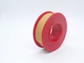 Tan medical adhesive tape in roll isolated in white background Royalty Free Stock Photo