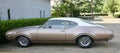 Tan Oldsmobile Cutlass Supreme