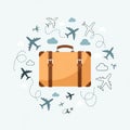 A tan suitcase with dark brown straps is centered, surrounded by various airplane illustrations in Royalty Free Stock Photo