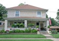 Tan and White Mottled Stucco House with Plants Royalty Free Stock Photo