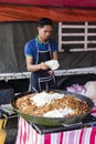 Tanah Rata, Malaysia, December 17 2017: Chef cooks fried noodles Royalty Free Stock Photo