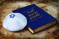 Tanakh - Hebrew Bible and Kippah with Jewish star, Jewish symbols. Concept - Jewish religion, Jews and Judaism