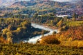 Tanaro river and autumnal trees in Italy. Royalty Free Stock Photo