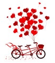 Tandem Bike with hearts balloons in red colors isolated