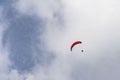 Tandem flight high up in the sky with a few clouds Royalty Free Stock Photo