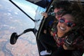 Tandem parachute jump. Beautiful Brazilian woman