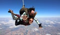 Tandem parachute jump. Beautiful Brazilian woman
