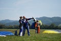 Tandem parachute jump, emotions shortly after the moment of landing shot