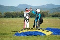 Tandem parachute jump, emotions shortly after the moment of landing shot