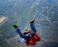 Tandem parachute jump out of a plane Royalty Free Stock Photo