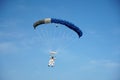 Tandem parachute jump shortly before the moment of landing shot