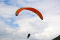 Tandem Paraglider flying wing in a blue sky Royalty Free Stock Photo