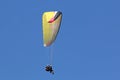 Tandem Paraglider flying wing in a blue sky Royalty Free Stock Photo