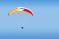 Tandem paraglider free gliding in deep blue sky