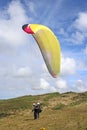 Tandem paraglider launching at Newgale, Wales Royalty Free Stock Photo