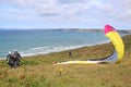 Tandem paraglider launching at Newgale, Wales Royalty Free Stock Photo