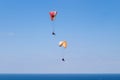 Tandem paragliding above mediterranean sea Royalty Free Stock Photo