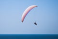 Tandem paragliding above Mediterranean sea