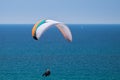 Tandem paragliding above mediterranean sea