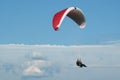 Tandem paragliding high in clouds