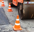 Tandem road roller and traffic cones on the road construction Royalty Free Stock Photo