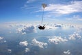 Tandem skydiving in the cloudy amazing sky. Royalty Free Stock Photo