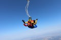 Tandem skydiving. A parachute is deploying.