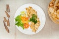 Tandoori khazana kebab with salad and pickle and bread served in a dish isolated on table top view of indian spices food Royalty Free Stock Photo