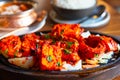 Tandoori Paneer Tikka. Cubes of cottage cheese, tomatoes, bell peppers and onion finished in clay oven Royalty Free Stock Photo