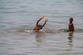 Tanganyika kids swimming in the lake Royalty Free Stock Photo