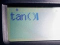Tangent is a trigonometry function displayed on the calculator screen Royalty Free Stock Photo